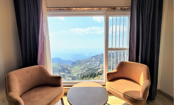 Luxury Inn Mussoorie room with scenic mountain view