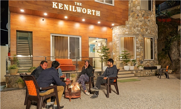 The Kenilworth Mussoorie outdoor seating area with bonfire