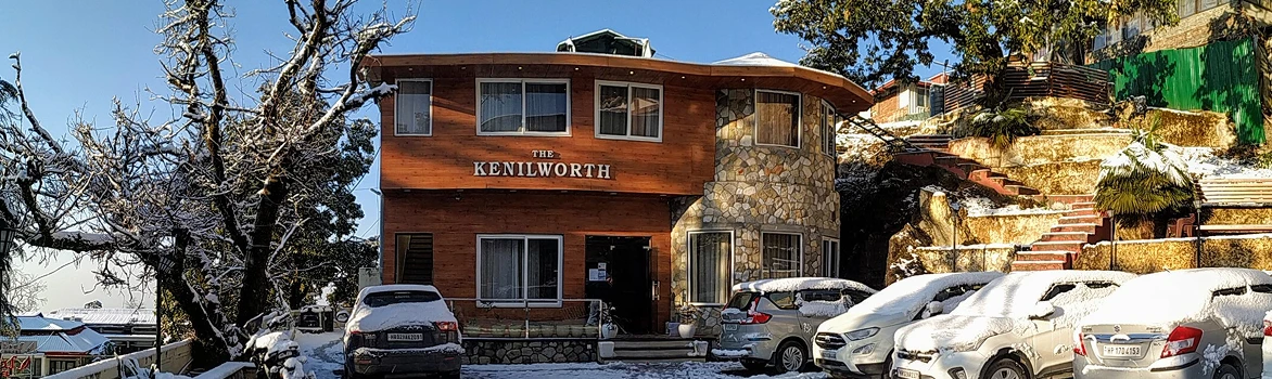 The Kenilworth Mussoorie hotel building view in snow