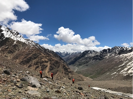 Snow-capped Himalayan mountains under a blue sky