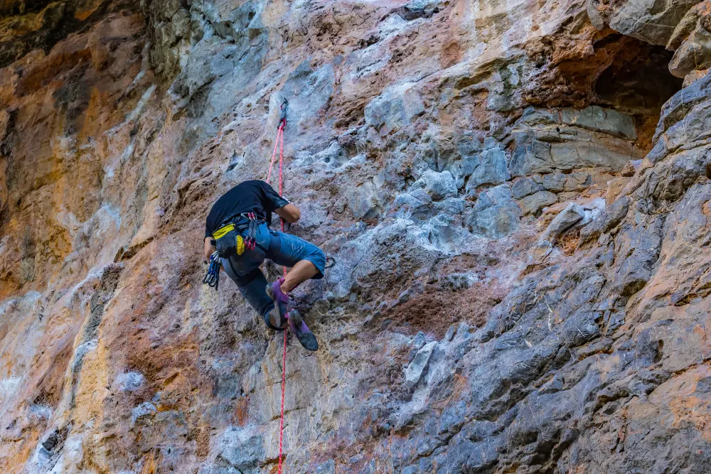 Rock climbing on the boulders at Bara Patthar, Nainital