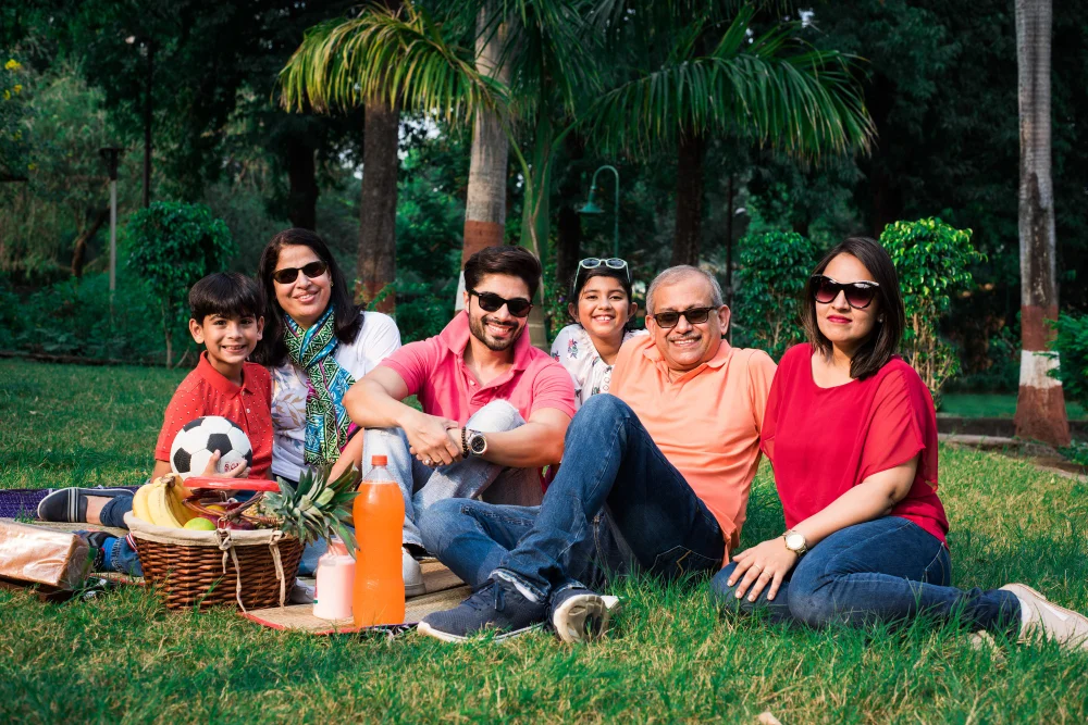 Picnic set out in a green meadow in the hills