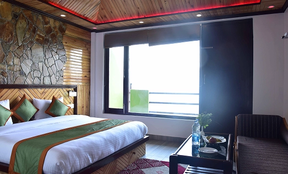 Sunita Himalayan Paradise luxury bedroom with window view